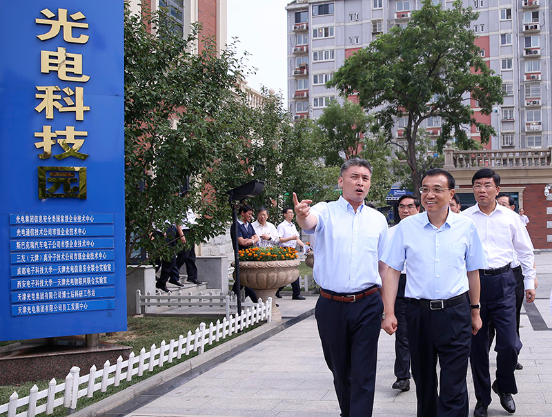 李克強體驗“飛鴿”:我愿為中國自行車做廣告