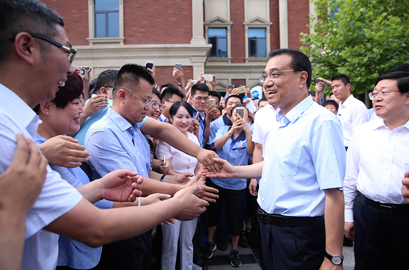 李克強體驗“飛鴿”:我愿為中國自行車做廣告