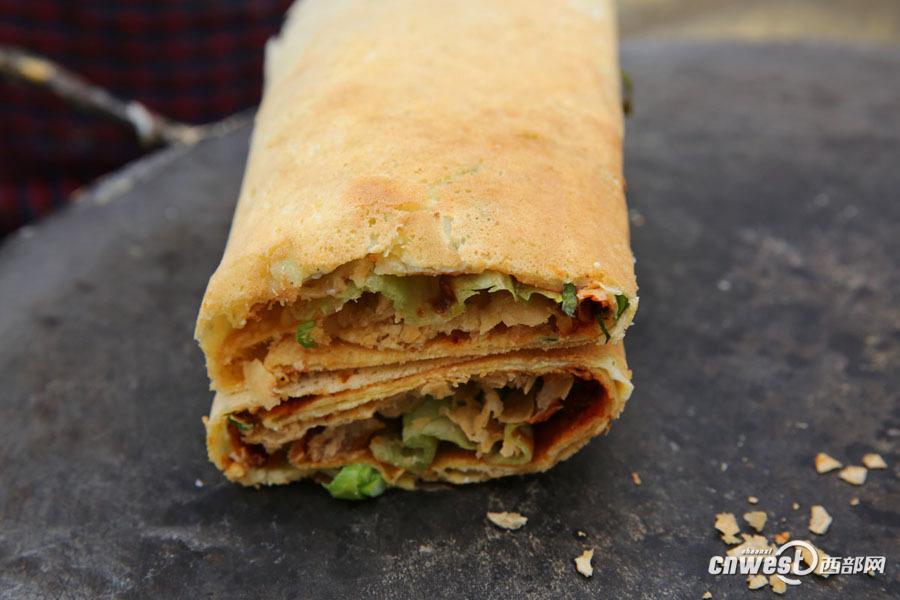 西安煎餅夫妻 9年堅(jiān)持為特殊群體提供免費(fèi)煎餅（組圖）