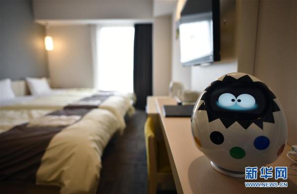 恐龍機(jī)器人是服務(wù)員！ 日本現(xiàn)“奇異賓館”（組圖）