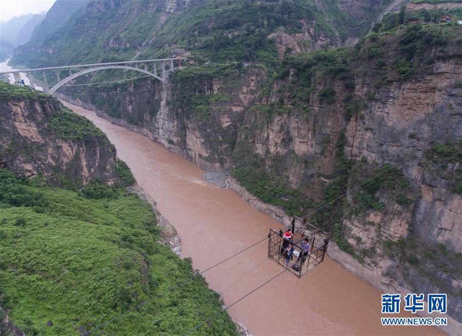 大橋飛架 天塹變通途——金沙江告別“溜索時代”