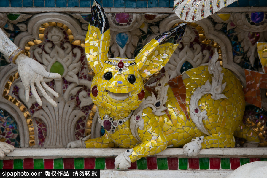 泰國曼谷一廟宇驚現超人、皮卡丘等動漫雕像 跨界裝飾創意無窮！